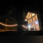 Cabaña tipo loft iluminada de noche entre los árboles, Jardín y Cabañas DANINI